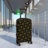 Queen’s Designer Escape Awaits Suitcase