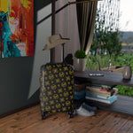 Queen’s Designer Escape Awaits Suitcase