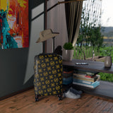 Queen’s Designer Escape Awaits Suitcase