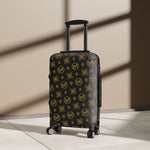 Queen’s Designer Escape Awaits Suitcase